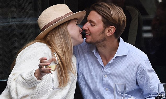 Love sealed with a kiss — Alice Eve and Alex Cowper-Smith share a romantic moment. 
